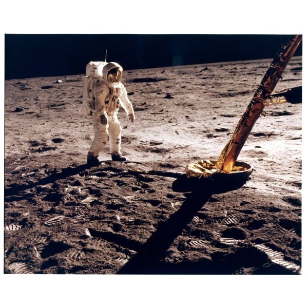 Buzz Aldrin near a leg of the Lunar Module