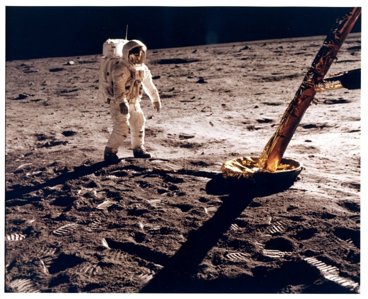 Buzz Aldrin near a leg of the Lunar Module